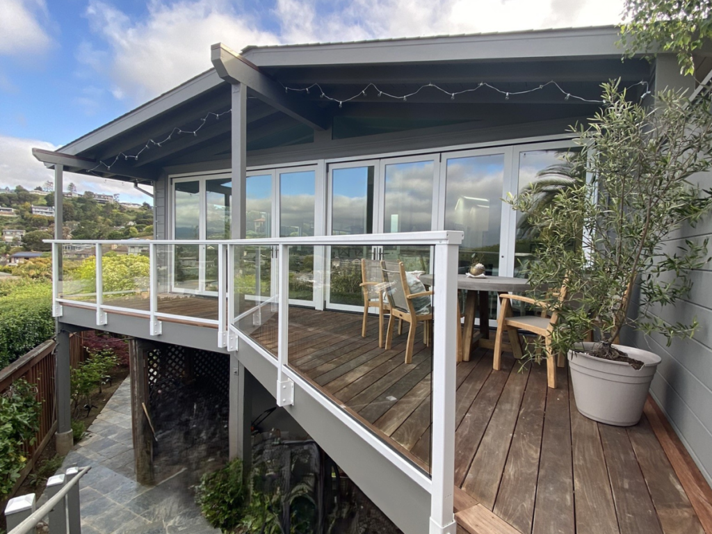 Elevated porch and outdoor living space, linking to client testimonials