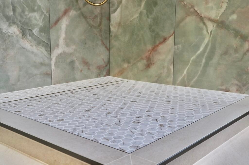 Detailed concrete and tile work associated with slab foundation construction